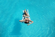 © Volodymyr - Young woman relaxing in pool