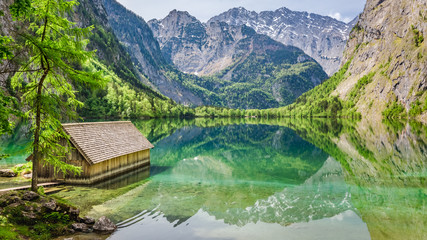 Wall Mural - stunning view of little cottage on the lake obersee in alps