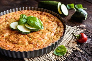 Wall Mural - Zucchini pie with bacon, cheese and herbs