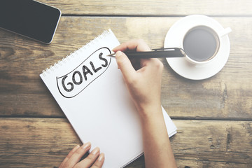 goals written on a notebook