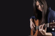 © Tommaso Lizzul - beautiful young woman playing acoustic guitar
