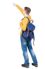 Canvas Print - Back view of  pointing young men with backpack.  Young guy gesture. Rear view people collection.  backside view of person.  Isolated over white background.
