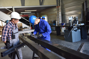 Wall Mural - Metalwork student training in workshop