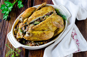 Wall Mural - Baked chicken stuffed with buckwheat and zucchini