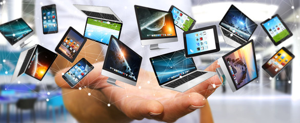 Wall Mural - businessman connecting tech devices to each other ‘3d renderin
