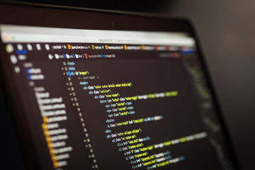html and css code developing screenshot. laptop screen.