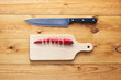 © marcinm111 - Chopped cayenne chilli pepper on cutting board with knife