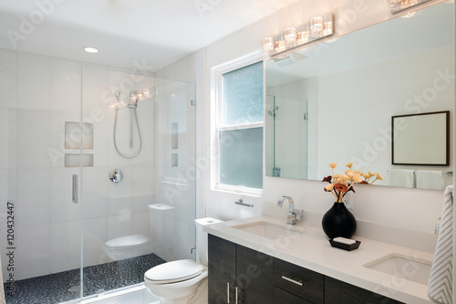 Láminas Modern bathroom interior with glass door shower and white cabine