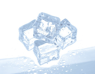 Wall Mural - ice cubes with water drops isolated on white