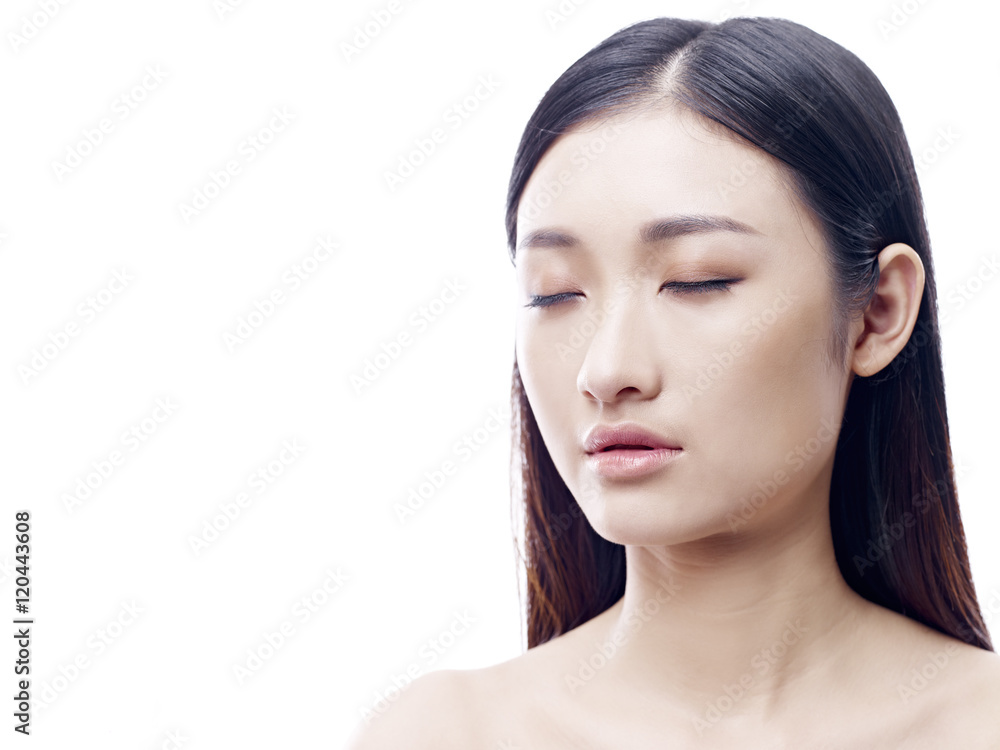 portrait of a young asian woman, isolated on white background