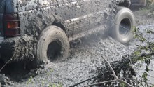 4x4 Offroad Truck With Lots Of Mud On It During A Rally