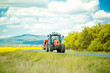 © Volodymyr - Farm tractor drives on road