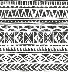 Wall Mural - vector hand drawn tribal print. primitive geometric background in grunge style.