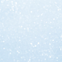 Wall Mural - unfocused abstract light blue glitter bokeh holiday background. winter xmas holidays. christmas.