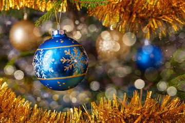 Wall Mural - Decoration bauble on decorated Christmas tree