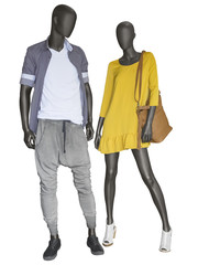 Sticker - Two mannequins, male and female, dressed in casual clothes.