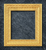 Fototapeta  - gold frame on black slate background