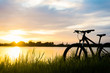 Silhouette Mountain bike sunset at river