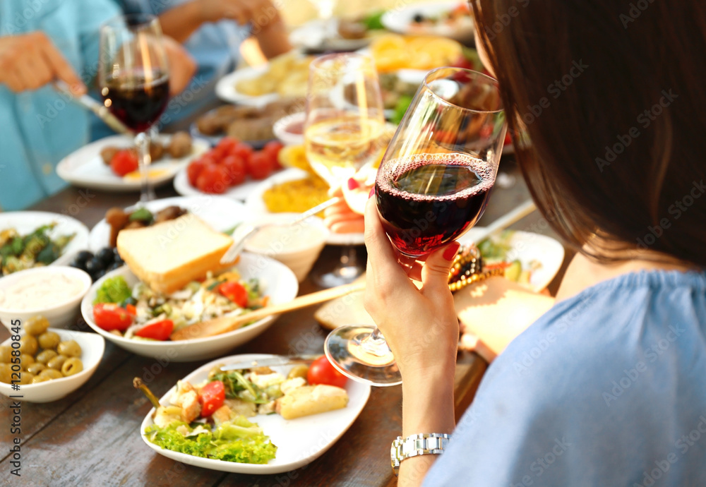Friends eating on picnic