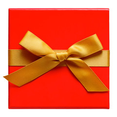 Red Gift box with gold ribbon and bow isolated on white.