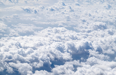 Wall Mural - Aerial view of cloud and sky from airplane,Traveling concept