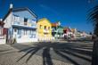 © robertharding - Colourful stripes decorate traditional beach house style on houses in Costa Nova, Portugal