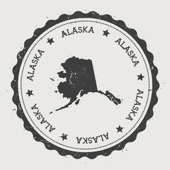 Wall Mural - Alaska vector sticker. Hipster round rubber stamp with US state map. Vintage passport stamp with circular Alaska text and stars, USA map vector illustration.