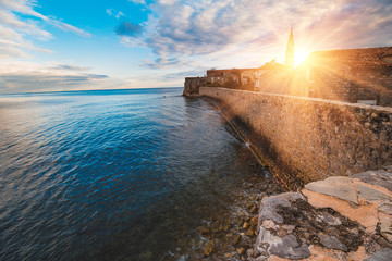 Wall Mural - View from the walls of the old town of Budva at sunset. Adriatic Sea. Montenegro. Europe.