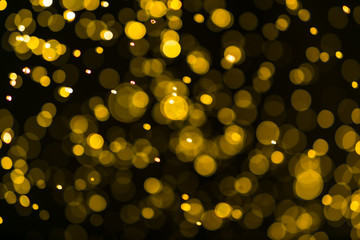 Wall Mural - glitter vintage lights background. dark gold and black. defocuse