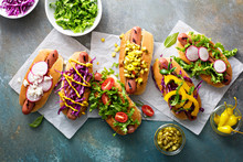 Variety Of Hot Dogs With Healthy Garnishes