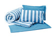 Blue set of pillows and blanket isolated on white background with clipping path.

