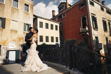 Wall Mural - Young beautiful Asian bride and groom