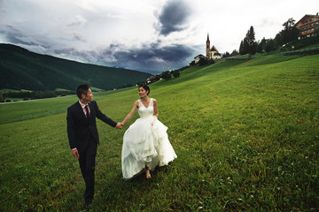 Wall Mural - asian newlyweds in italy