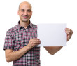 © spaxiax - bald man holding a blank sheet