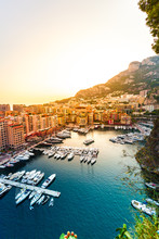 Panoramic View Of Port De Fontvieille In Monaco. Azur Coast. Colorful Bay With A Lot Of Luxury Yachts In Sunset.
