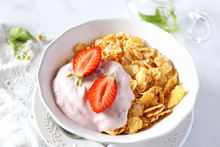 Corn Flakes In Bowl, Yogurt, Strawberries And Chia Seeds