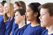 © highwaystarz - Group Of School Children Singing In Choir Together