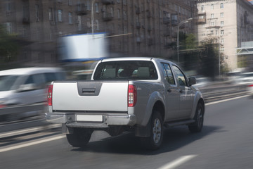 Wall Mural - pickup goes on the highway