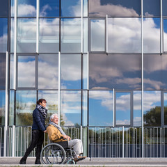 Wall Mural - Disabled grandfather and his grandchild