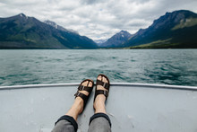 Feet And Sandals On Boat, Lake McDonald, Glacier National Park, Montana, Canada, United States Of America , Close Up