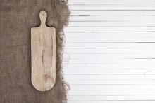 Empty Cheeseboard On White Wooden Background, Top View