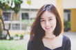 © tiniroma - thai adult student university beautiful girl relax and smile