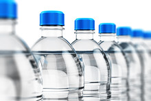 Row Of Plastic Drink Water Bottles