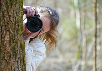 Wall Mural - Nature photographer shooting you