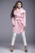 © dorriss - Beautiful long-haired woman in pink coat