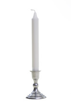Long Taper In A Silver Candlestick Isolated On A White Background