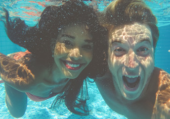 happy couple underwater