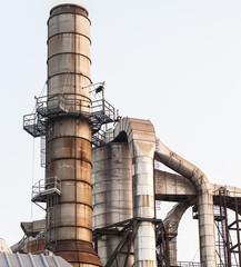 Chimney and silo of a factory.