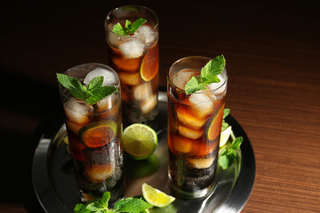 Poster - Metal tray with cuba libre cocktails, lime and mint on wooden table