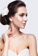 © Serg Zastavkin - Portrait of beautiful young brunette woman bride in white Weddin